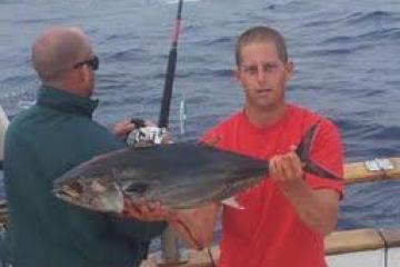 A man holding a fish