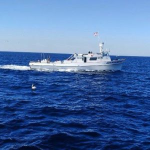 A white boat on the water